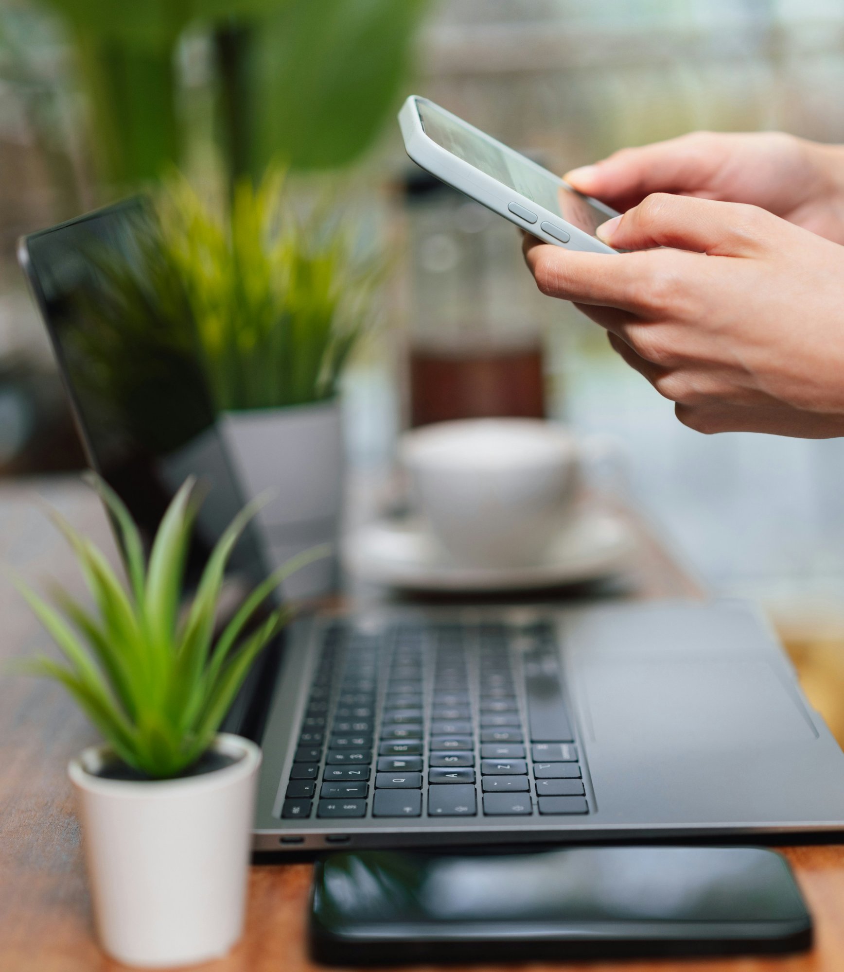 Virtual therapy session on phone and laptop